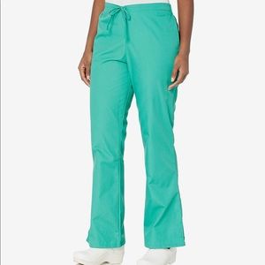 Cherokee Women’s Flare Leg Drawstring Scrub Pant in Surgical Green - XXS Petite